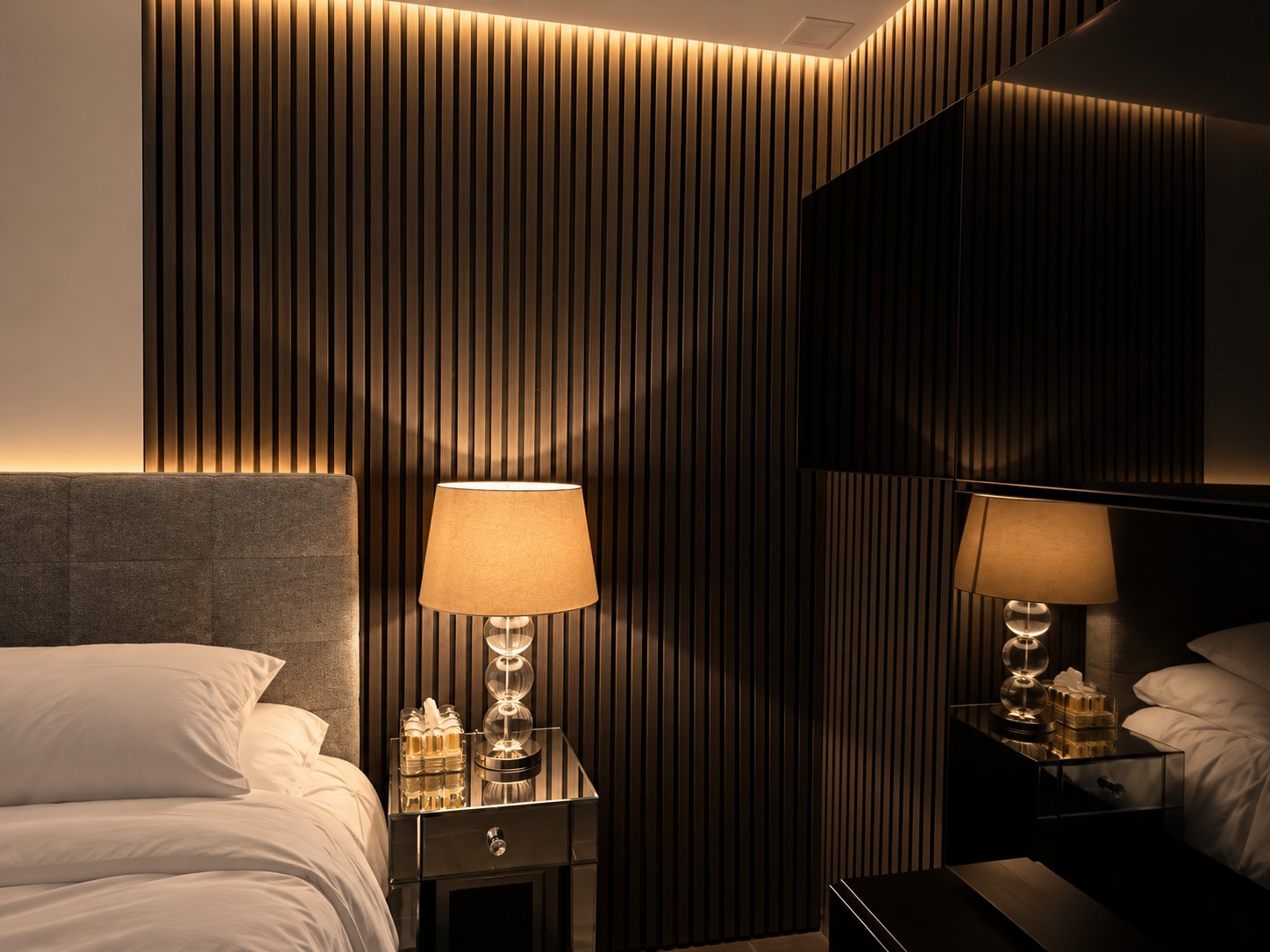Bedroom with slatted wall and indirect lighting