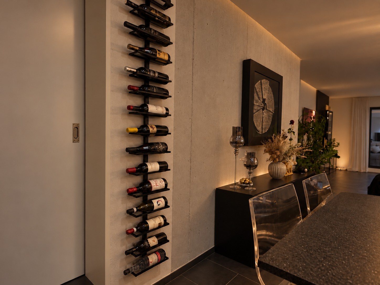 Wine rack on an exposed concrete wall with indirect light